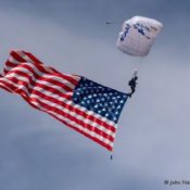 USAF Wings of Blue parachute jumper trailing the US Flag