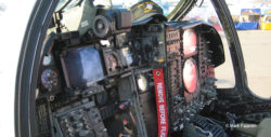 A-6E Intruder cockpit, showing side-by-side seating arrangement and many instruments, information screens, and controls.