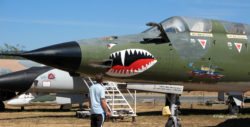 Nose of the F-105F Thunderchief, seen from the left front. The nose is painted with a snarling tiger's mouth. The refueling probe is extended.