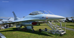F-16N Viper jet fighter on the grounds at the Pacific Coast Air Museum, viewed from the front left.