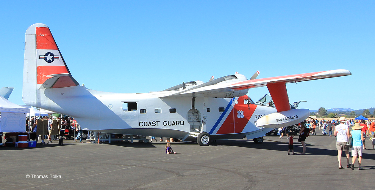 hu16e-albatross-pcam-02 HU-16 Albatross sitting on the ramp during an air show, painted in US Coast Guard colors and viewed from the right rear.
