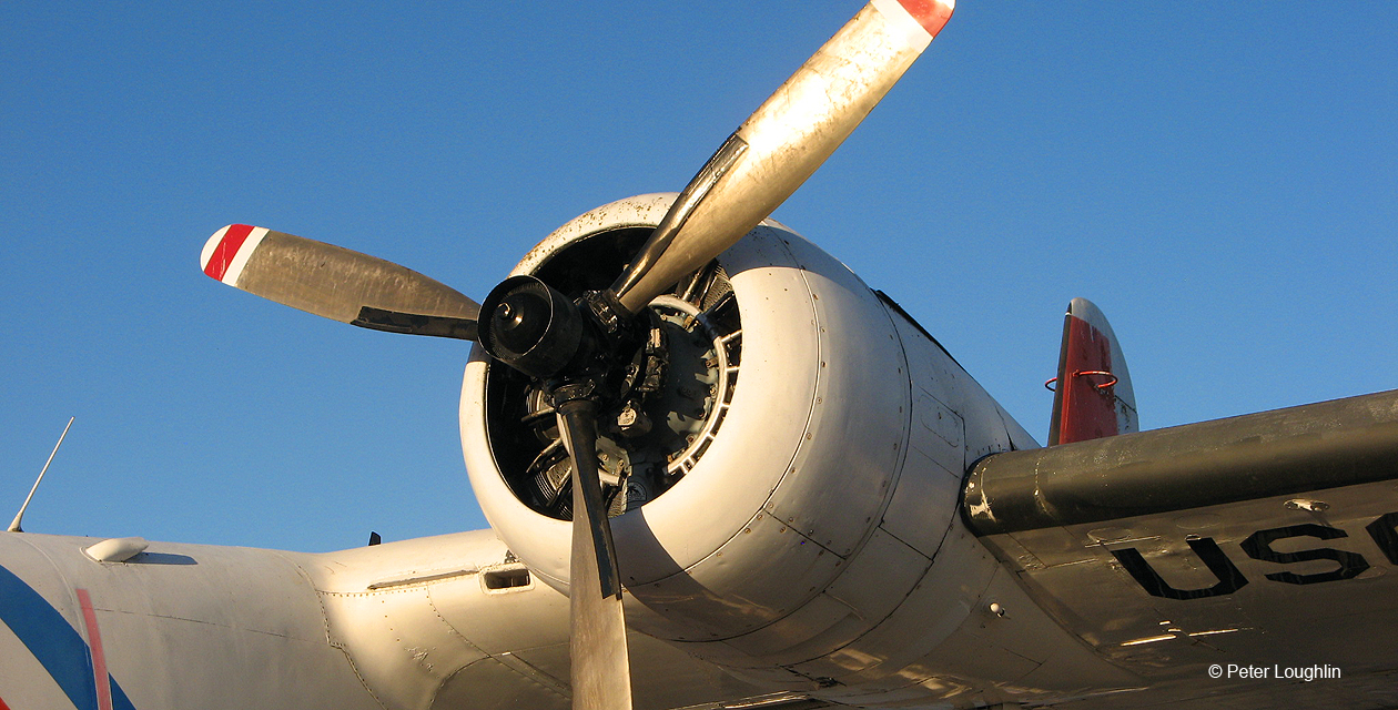 hu16e-albatross-pcam-06 Close-up view of HU-16 Albatross left engine, looking upward at it.