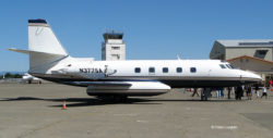 Lockheed Jetstar business jet, shown on the ground and directly from the side.